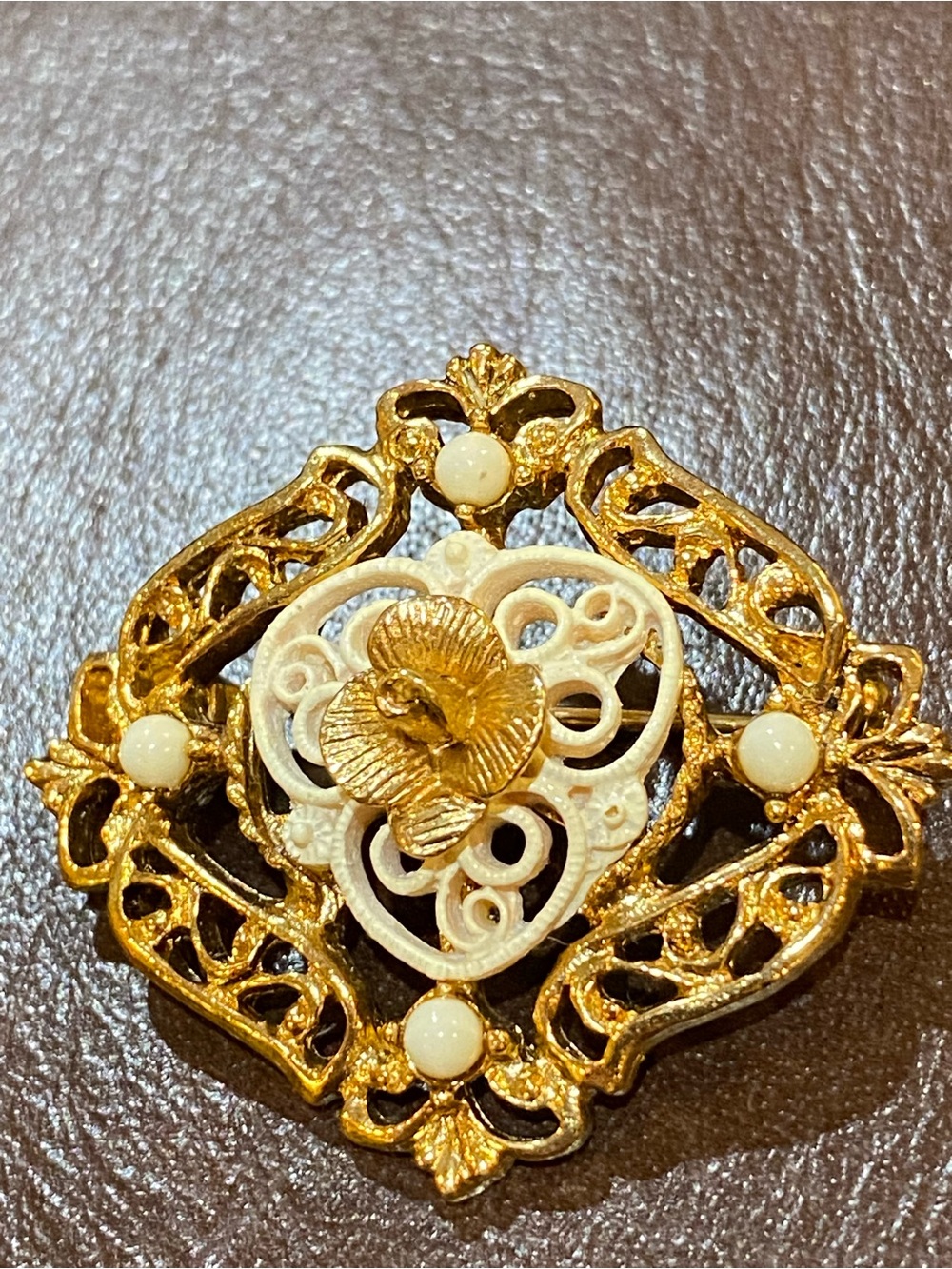 Vintage Gold-Tone Filagree Brooch with Cream Floral Scrollwork and Faux Pearls